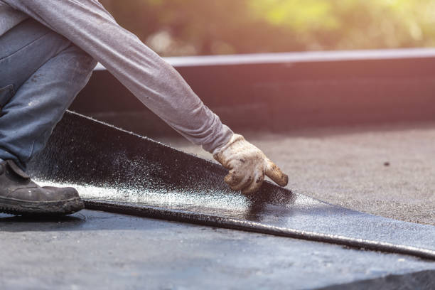 Professional Basement Waterproofing technician working in Cato, NY